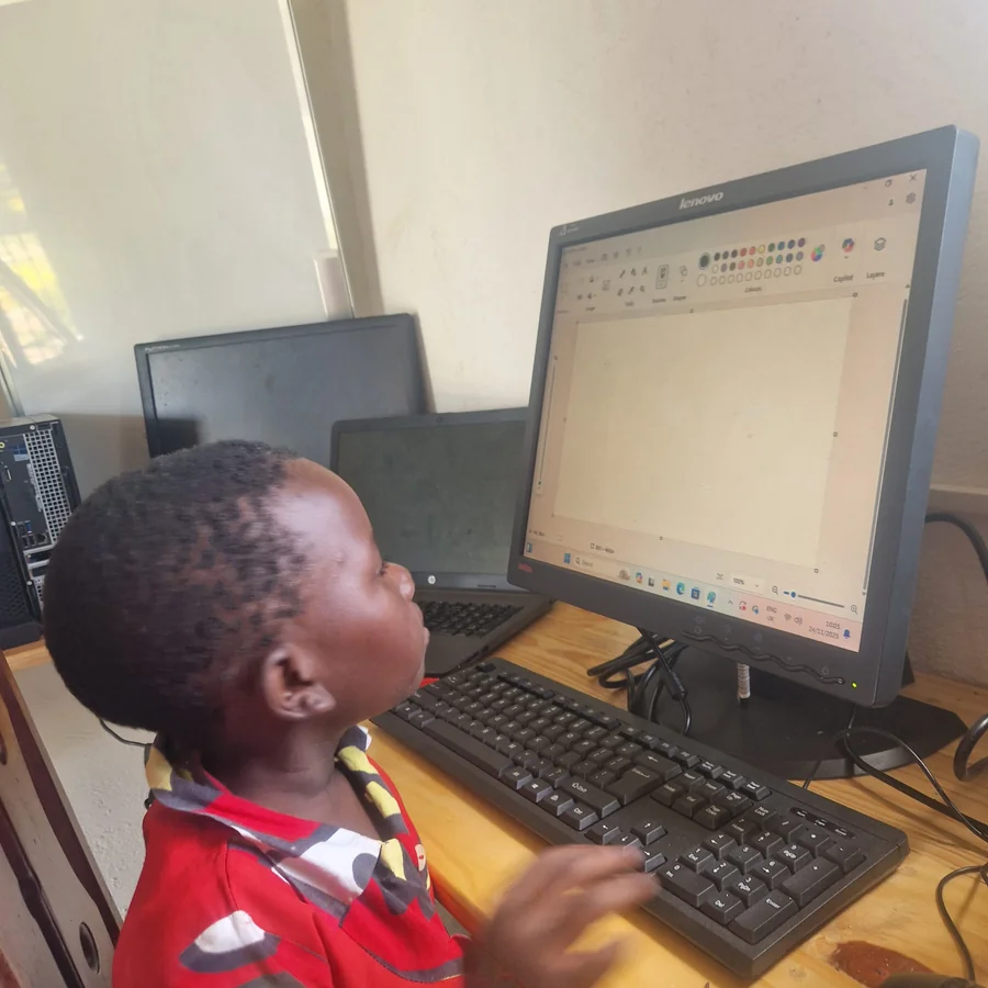 Child learning on computer